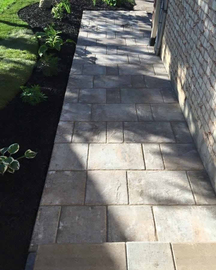 Landscaping and excavation project by Green Apple Landscaping Builders